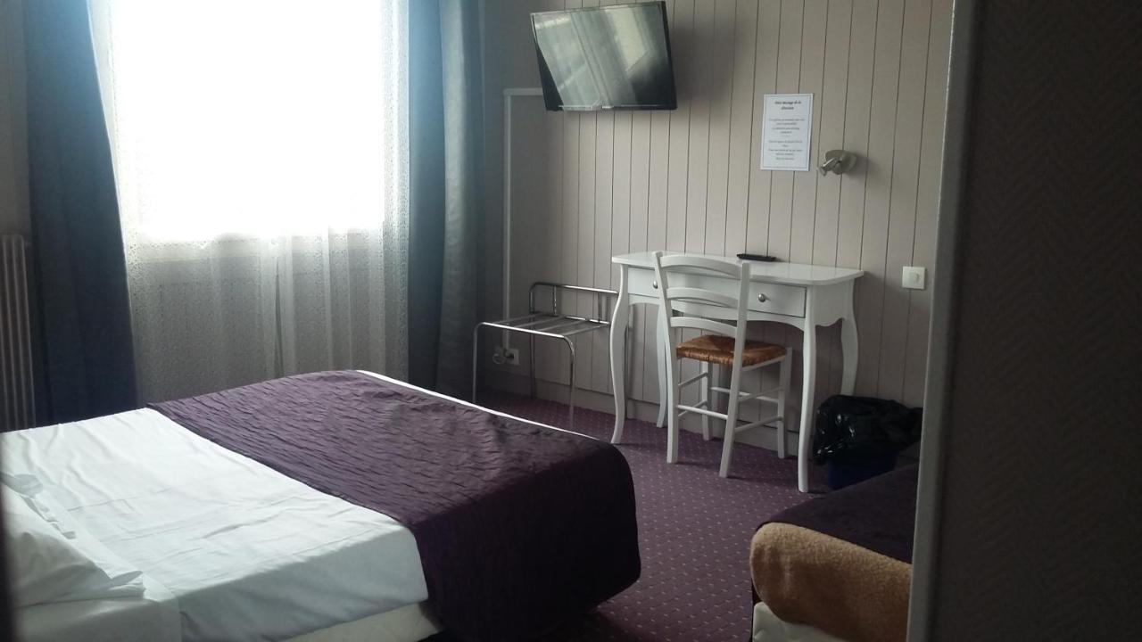 L' R Du Port Hotel Courseulles-sur-Mer Buitenkant foto