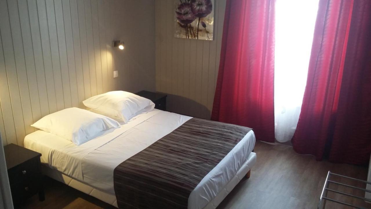 L' R Du Port Hotel Courseulles-sur-Mer Buitenkant foto